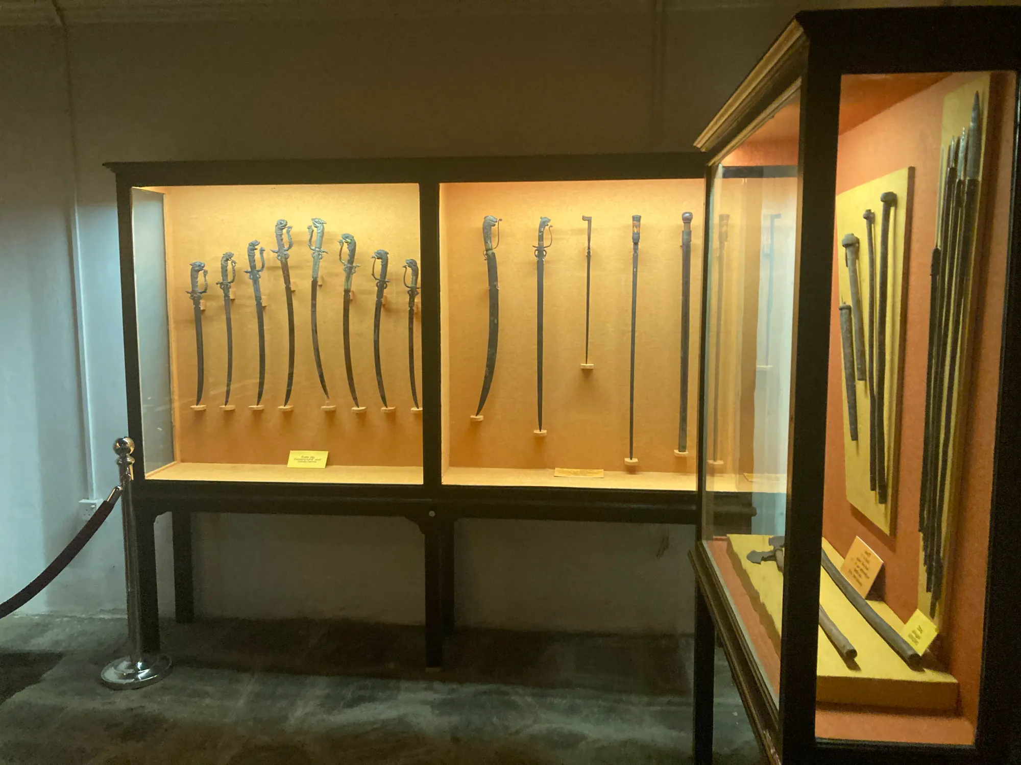 Swords, axes, spears and other weapons at the Kandy National Museum, Sri Lanka