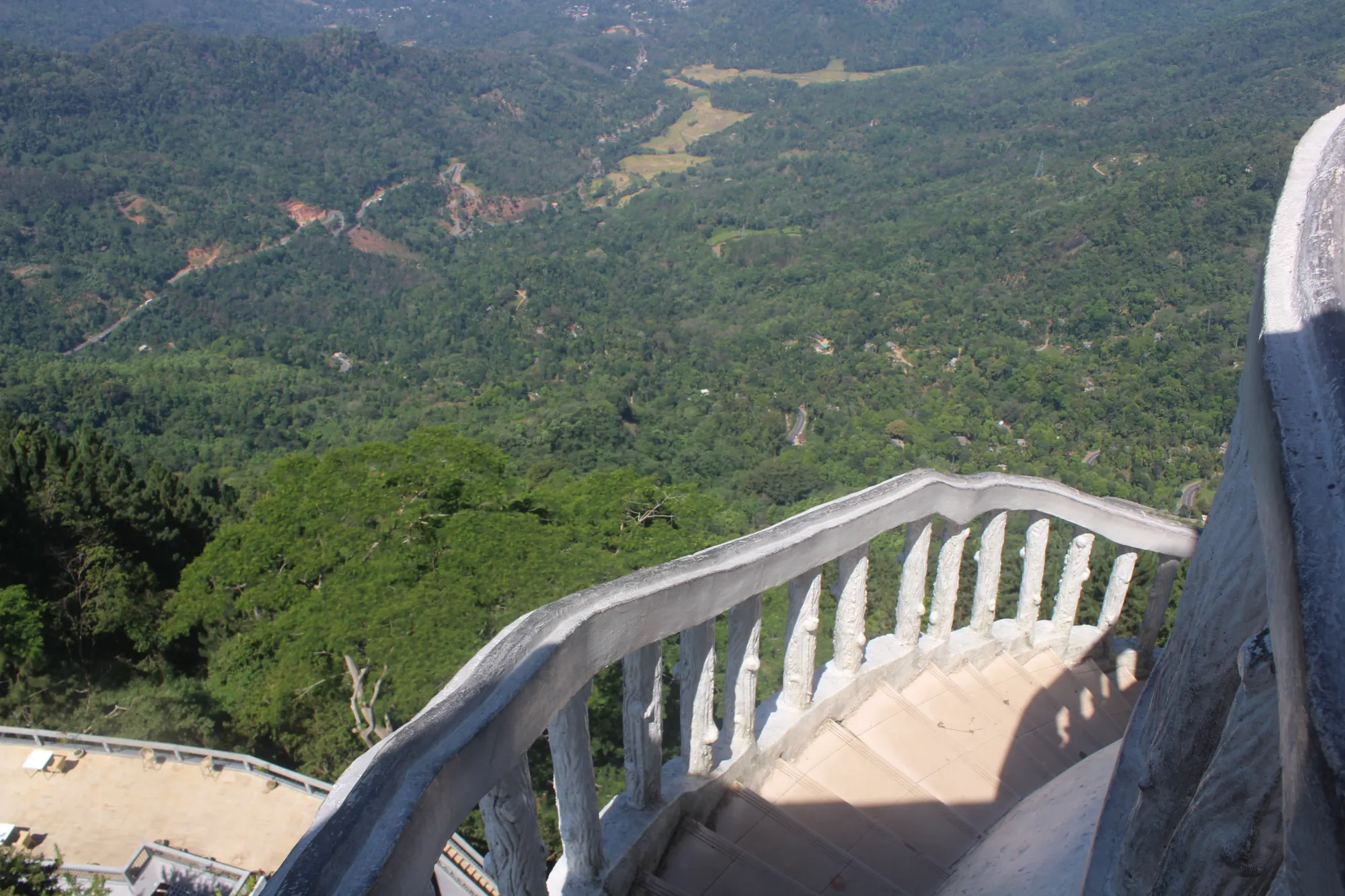 The staircase and surrounding scenery at Ambuluwawa tower in Sri Lanka