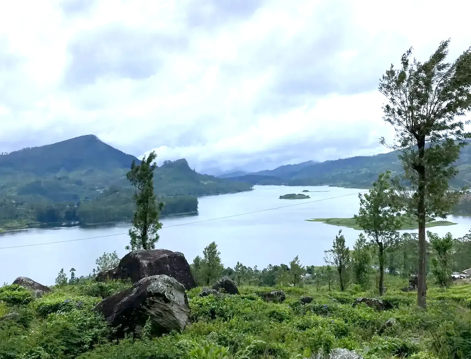 Maussakelle Reservoir and surrounding hills and greenery, in Maskeliya Sri Lanka.