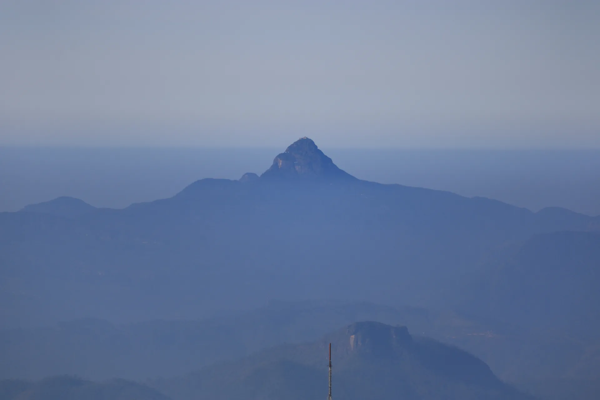 Adam's Peak covered in fog, near Maskeliya, Sri Lanka